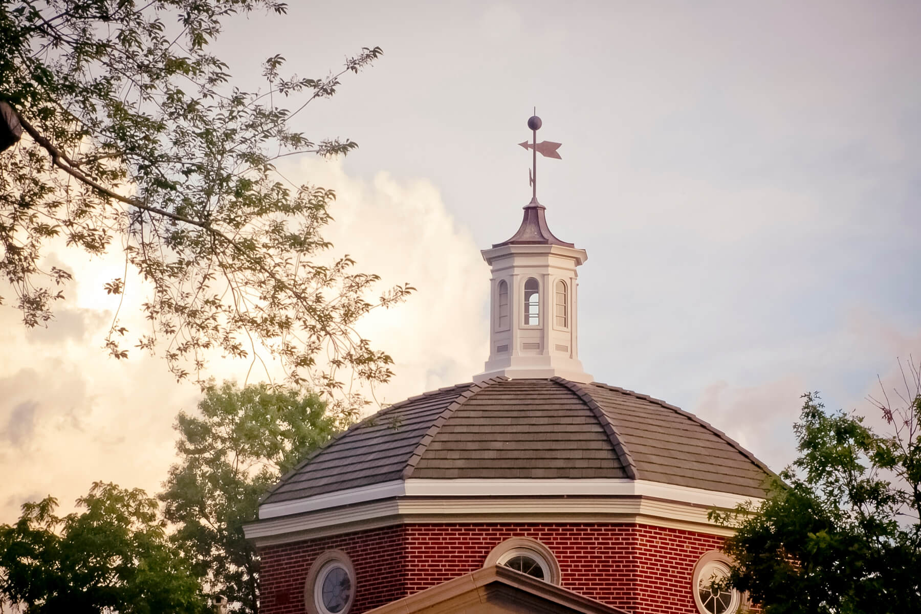 Cupola of a building with cloud in background