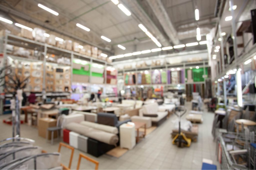 Warehouse and carpeting outlet in blurred